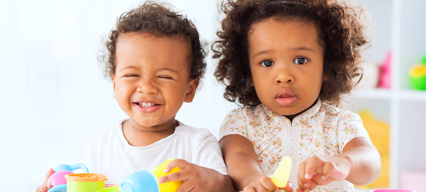 two kids smiling