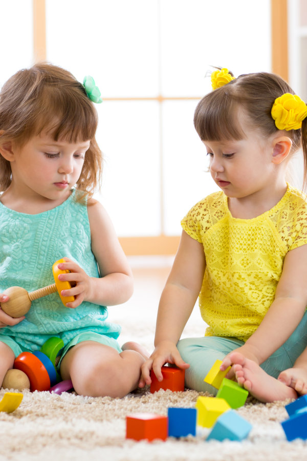 woman play with her students