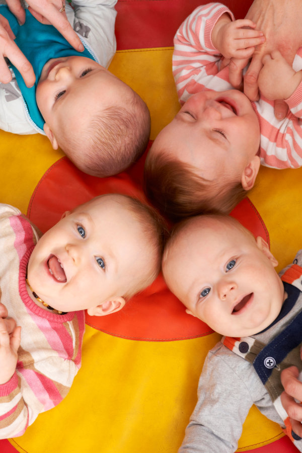 Babies Having Fun At Nursery Playgroup