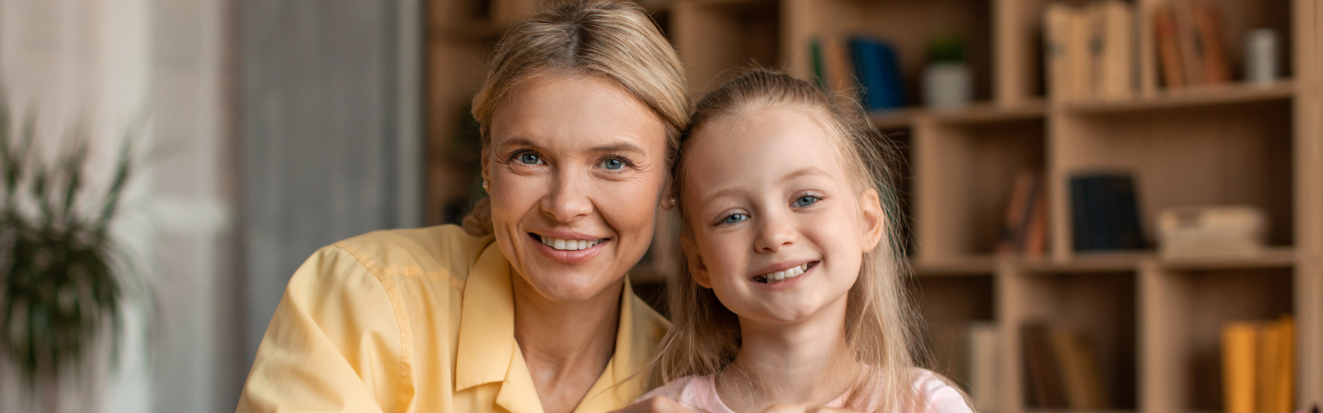 woman and her child smiling