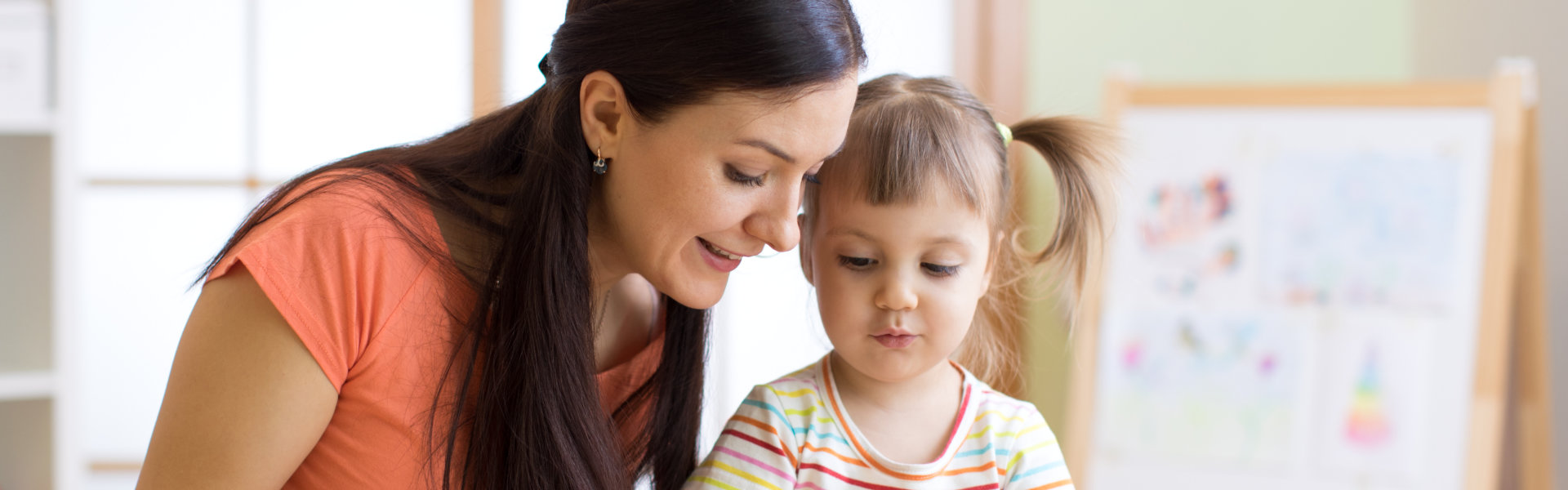 woman teach her daughter